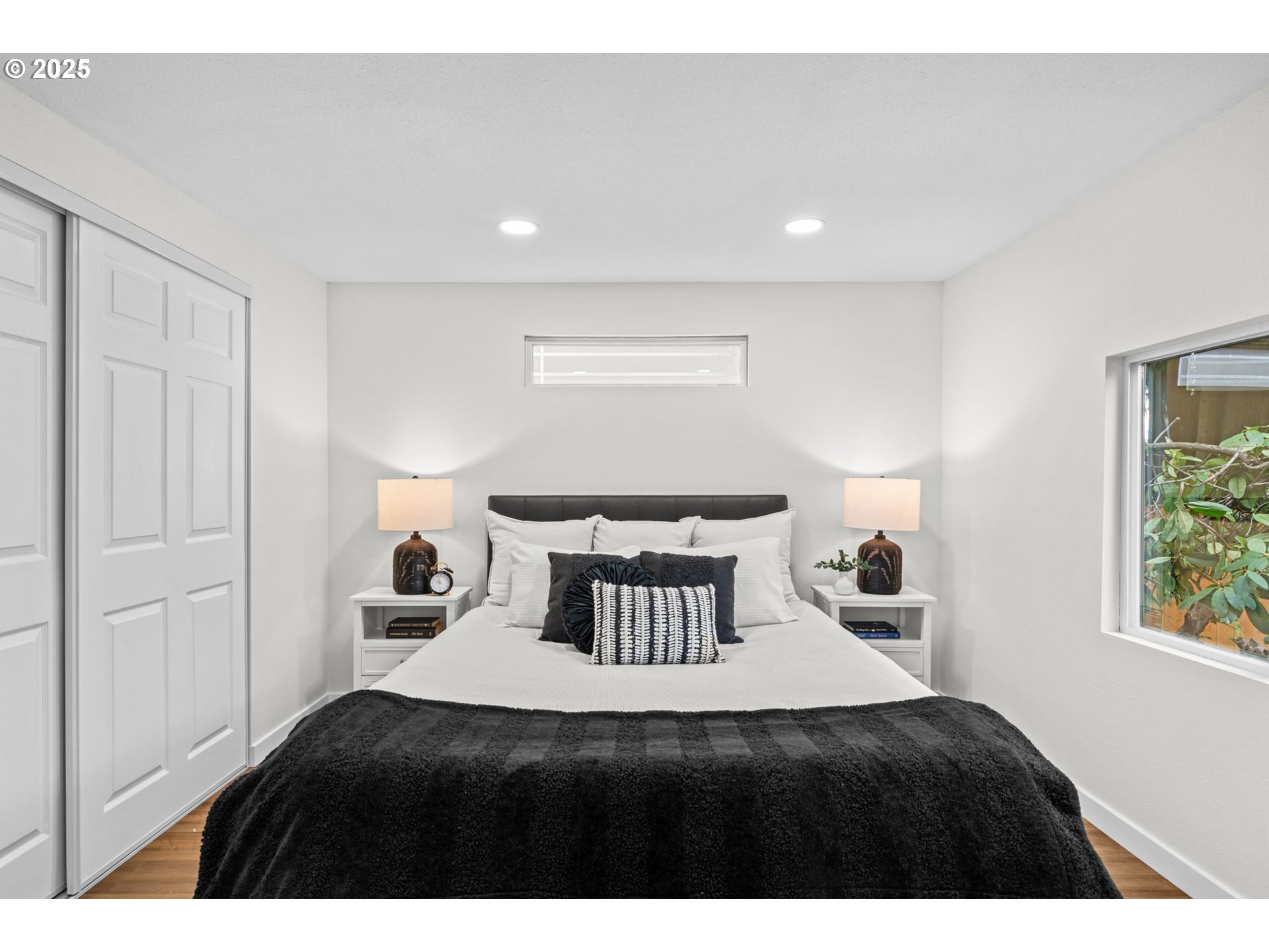 27645 Snyder Road Junction City, OR 97448 - Photo 16 of 41 a bedroom with a bed and a window