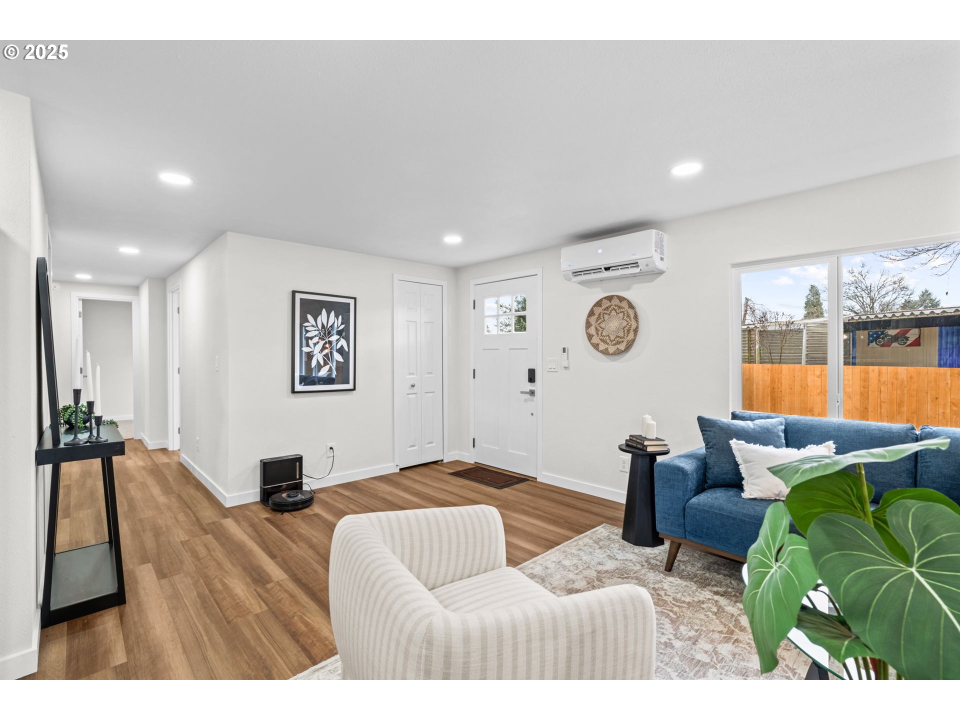 27645 Snyder Road Junction City, OR 97448 - Photo 2 of 41 a bedroom with furniture and a large window