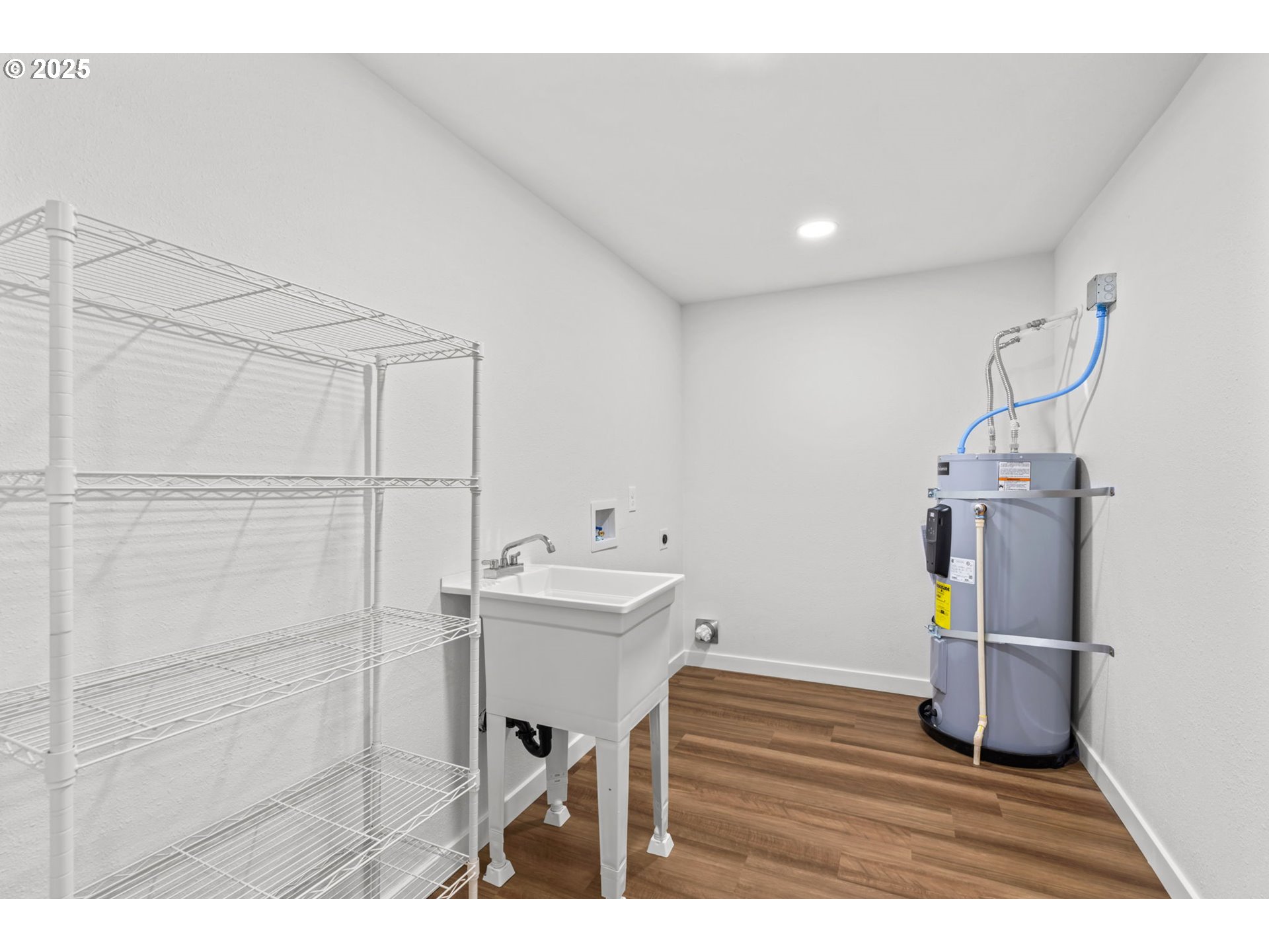 27645 Snyder Road Junction City, OR 97448 - Photo 22 of 41 a view of entryway with wooden floor