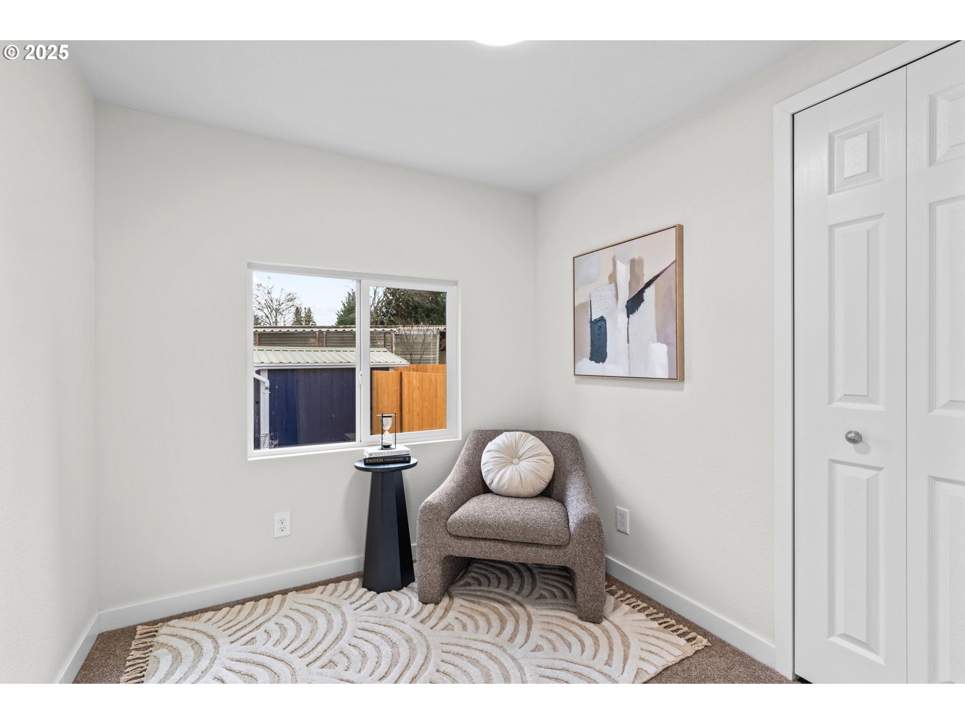 27645 Snyder Road Junction City, OR 97448 - Photo 24 of 41 a living room with furniture and a window