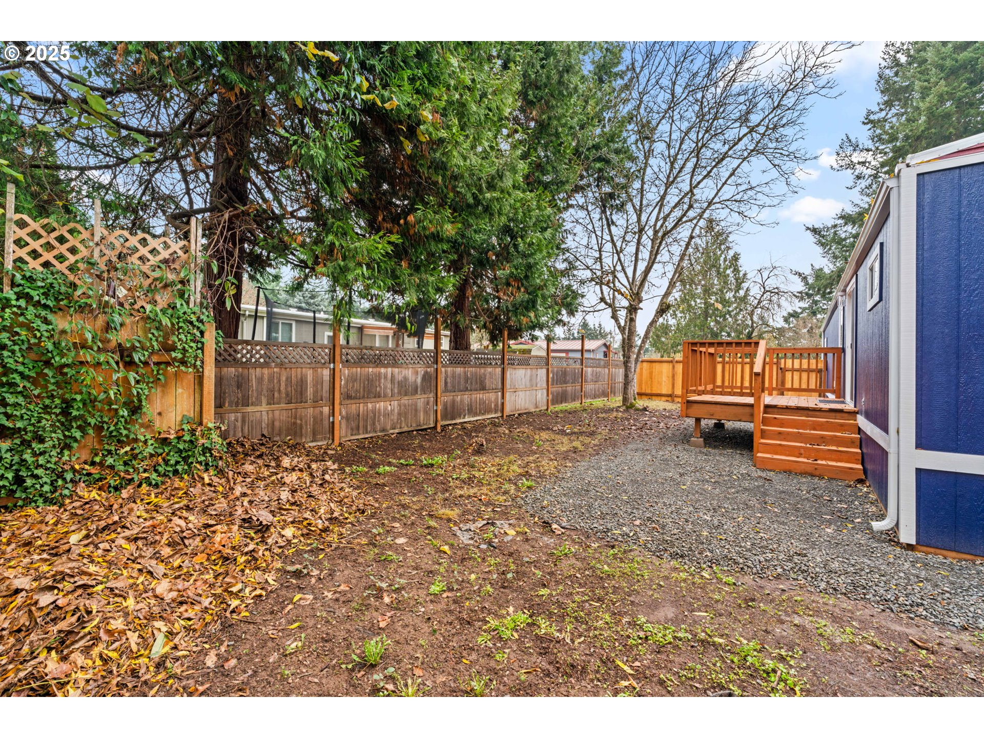 27645 Snyder Road Junction City, OR 97448 - Photo 36 of 41 a backyard of a house with trees and entertaining space