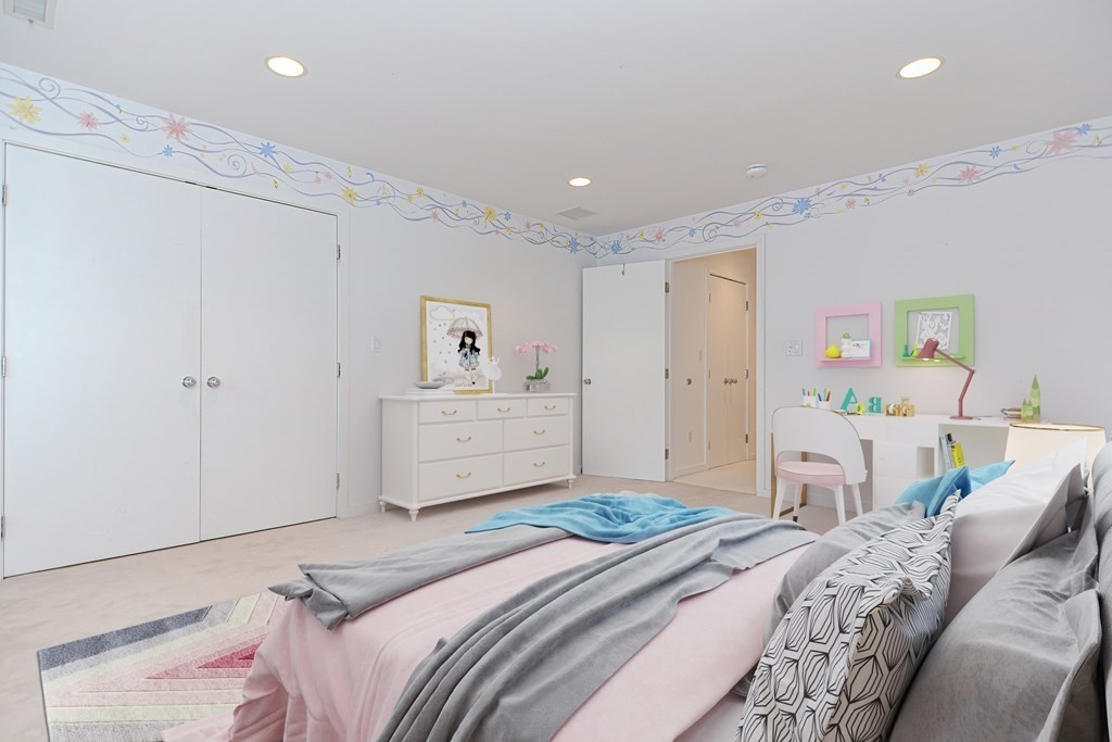 14 Columbine Road Newton, MA 02459 - Photo 15 of 36 a bedroom with a bed and a cabinets