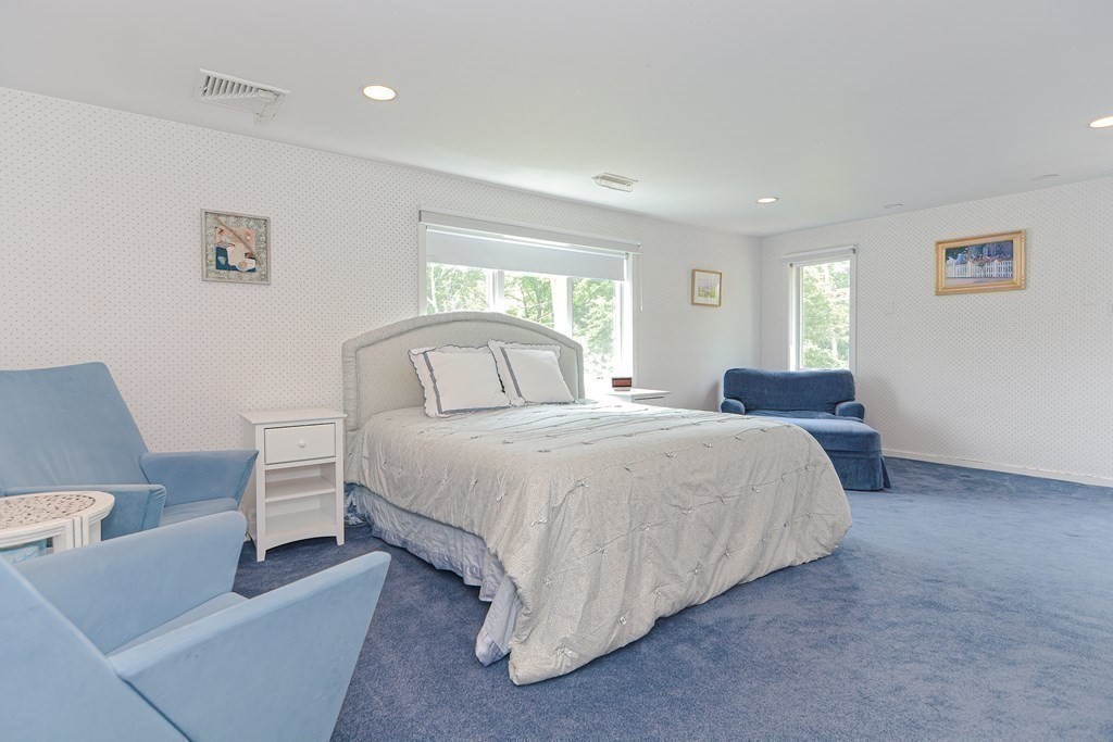 14 Columbine Road Newton, MA 02459 - Photo 16 of 36 a bedroom with a bed and a couch