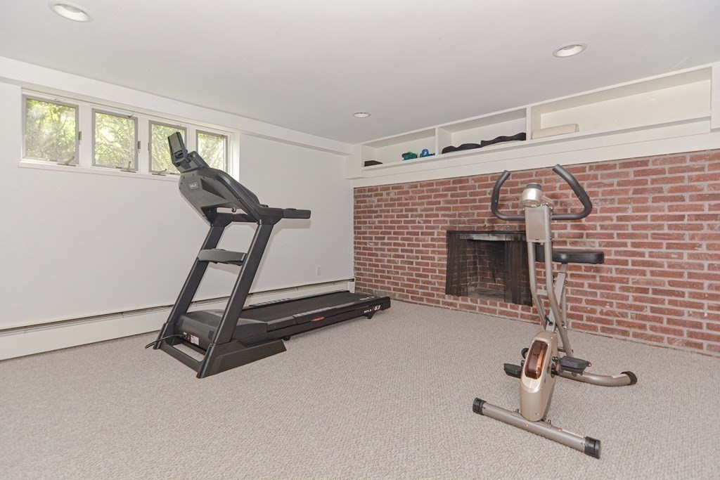 14 Columbine Road Newton, MA 02459 - Photo 20 of 36 a view of a room with gym equipment