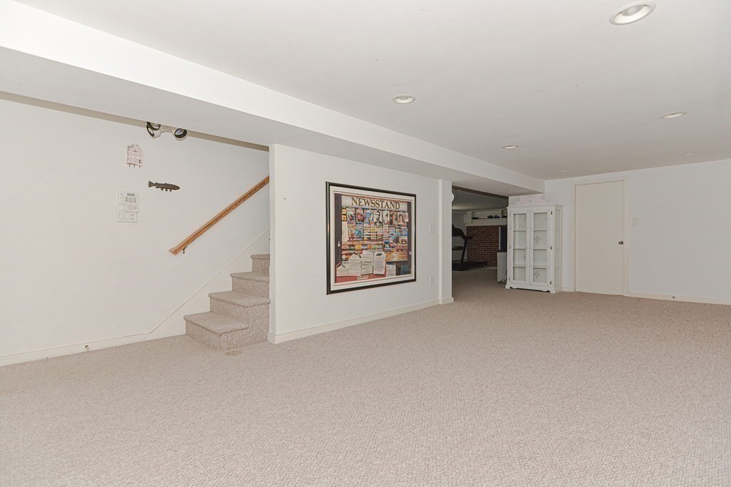 14 Columbine Road Newton, MA 02459 - Photo 23 of 36 a view of an empty room with stairs and ventilation