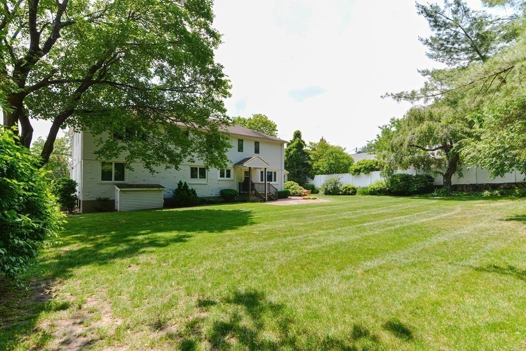 14 Columbine Road Newton, MA 02459 - Photo 29 of 36 a front view of a house with garden