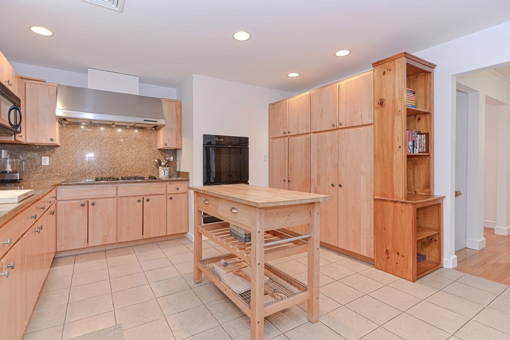 14 Columbine Road Newton, MA 02459 - Photo 7 of 36 a kitchen with stainless steel appliances a refrigerator sink and cabinets