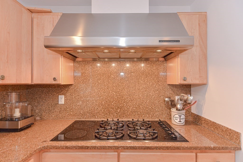 14 Columbine Road Newton, MA 02459 - Photo 8 of 36 a kitchen with a stove and cabinets
