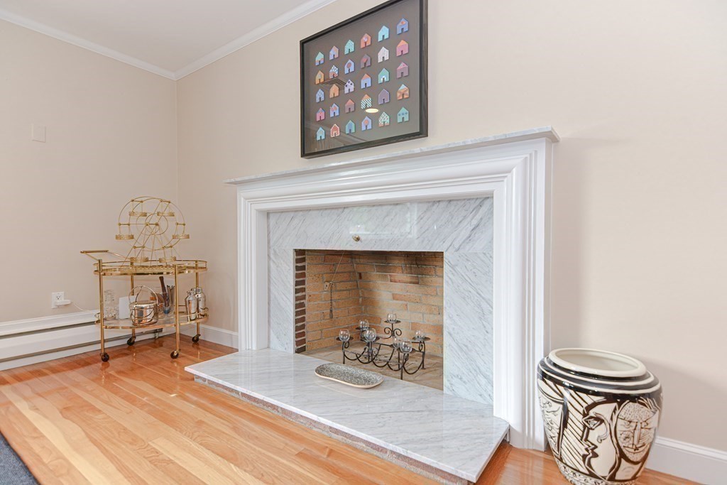 14 Columbine Road Newton, MA 02459 - Photo 9 of 36 a living room with furniture and a fireplace