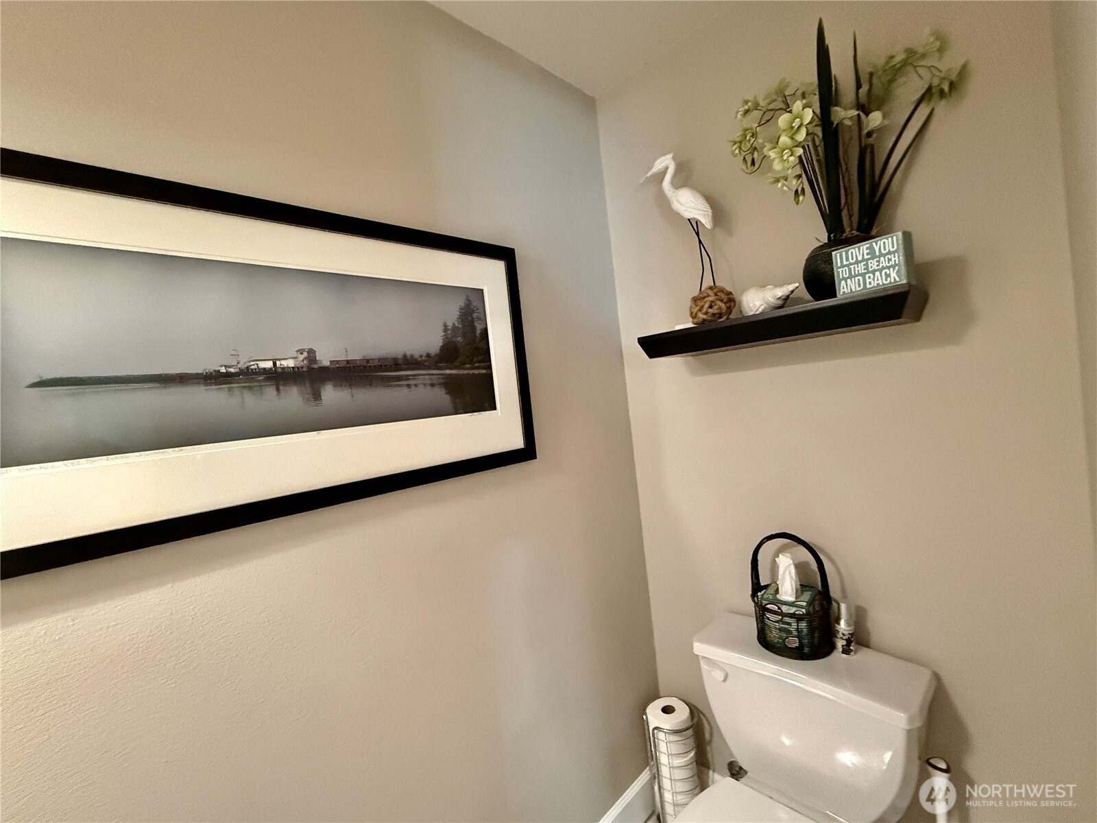 2815 Willows Road, Unit 210 Seaview, WA 98644 - Photo 19 of 35 a view of a hallway with washer and dryer