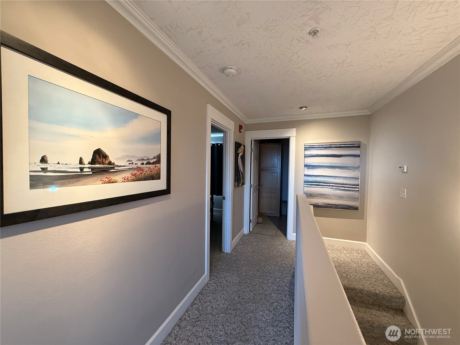 2815 Willows Road, Unit 210 Seaview, WA 98644 - Photo 22 of 35 a view of a hallway with wooden floor and closet