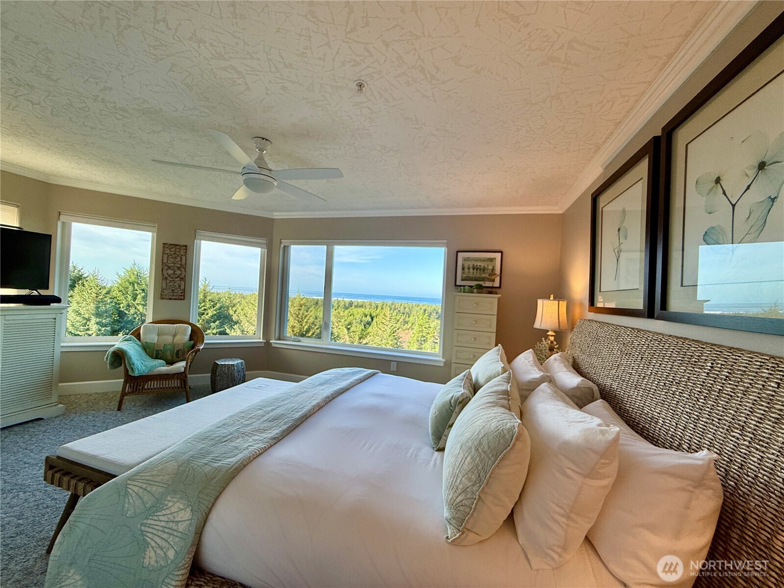 2815 Willows Road, Unit 210 Seaview, WA 98644 - Photo 23 of 35 a bed sitting in a bedroom next to a window