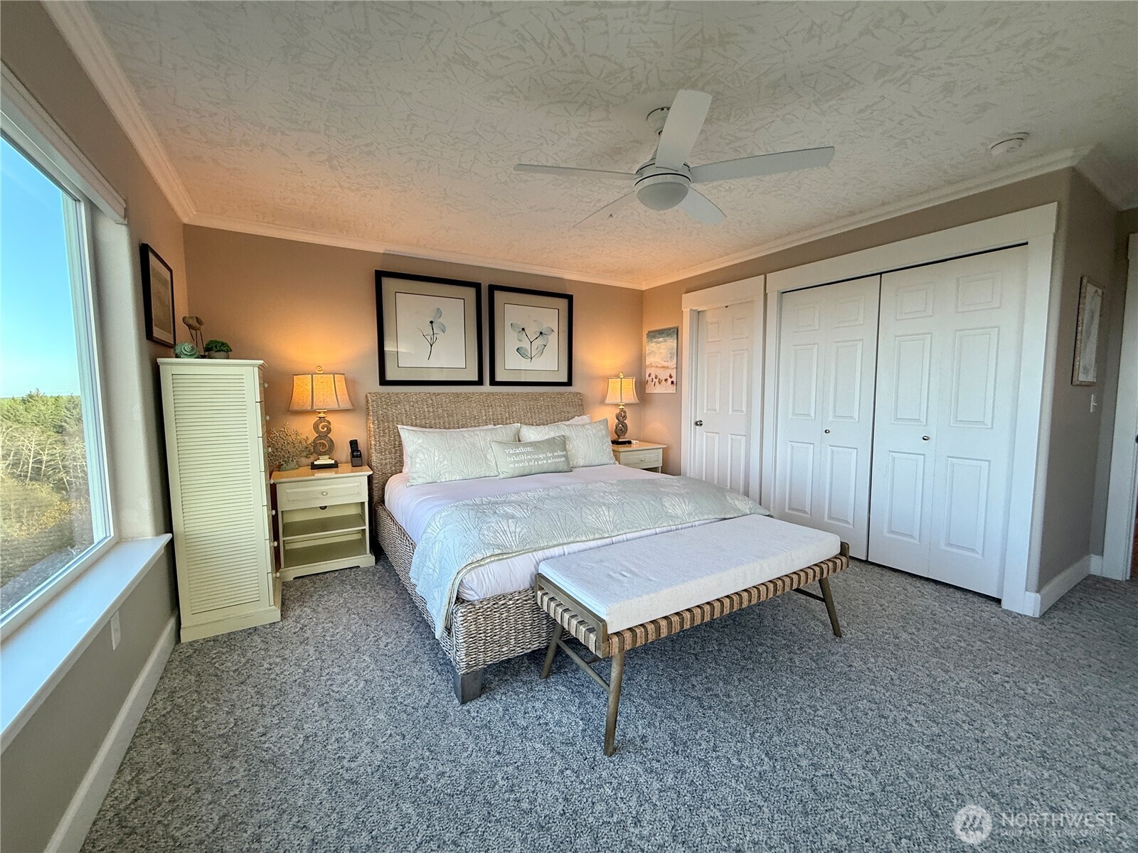 2815 Willows Road, Unit 210 Seaview, WA 98644 - Photo 25 of 35 a bedroom with a bed and a dresser