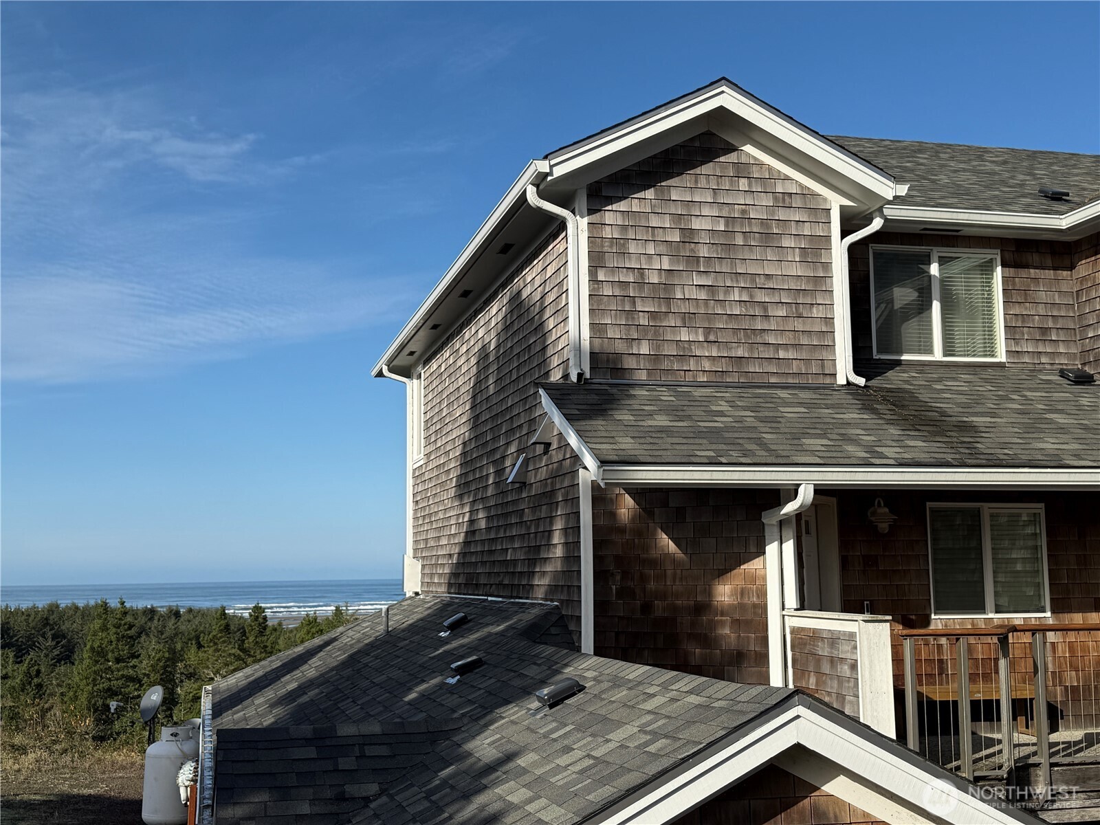 2815 Willows Road, Unit 210 Seaview, WA 98644 - Photo 31 of 35 a front view of a house with balcony