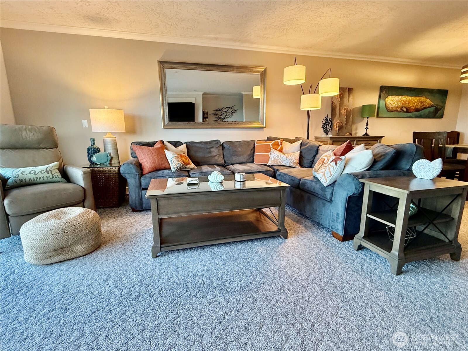 2815 Willows Road, Unit 210 Seaview, WA 98644 - Photo 8 of 35 a living room with furniture and a flat screen tv