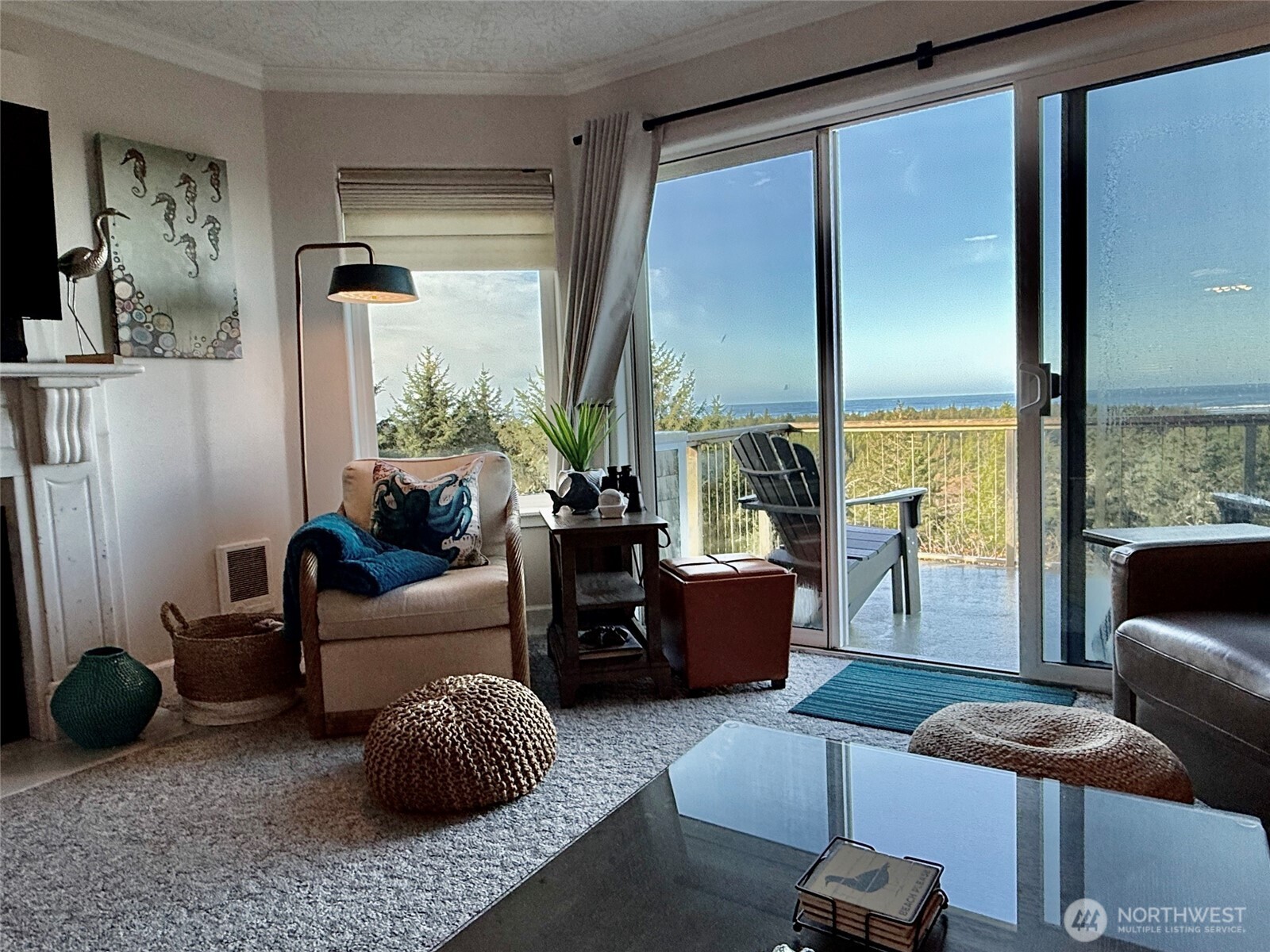 2815 Willows Road, Unit 210 Seaview, WA 98644 - Photo 10 of 35 a living room with furniture and a large window