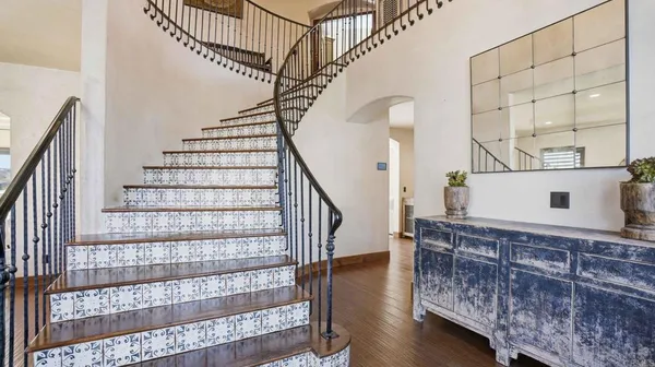 a view of entryway with wooden floor