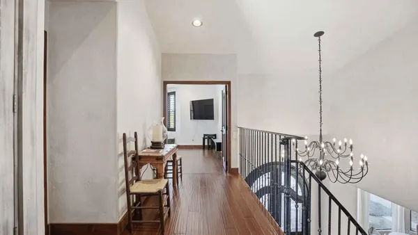 a view of entryway with wooden floor
