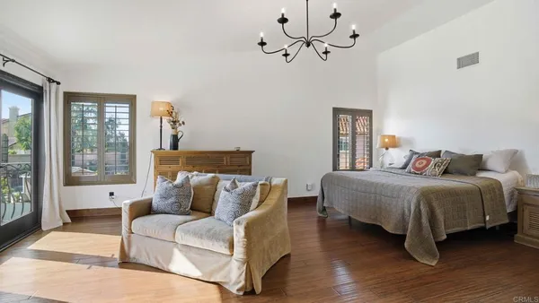 a living room with furniture fireplace and flat screen tv