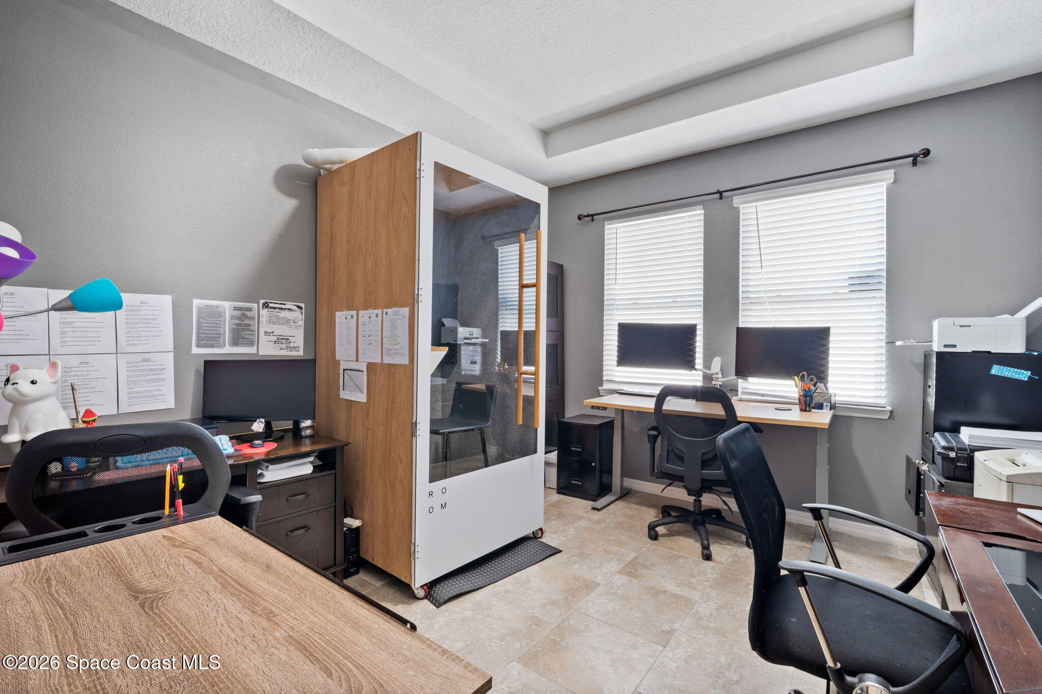 1941 Partin Terrace Road Kissimmee, FL 34744 - Photo 20 of 36 a view of a workspace with furniture and a window