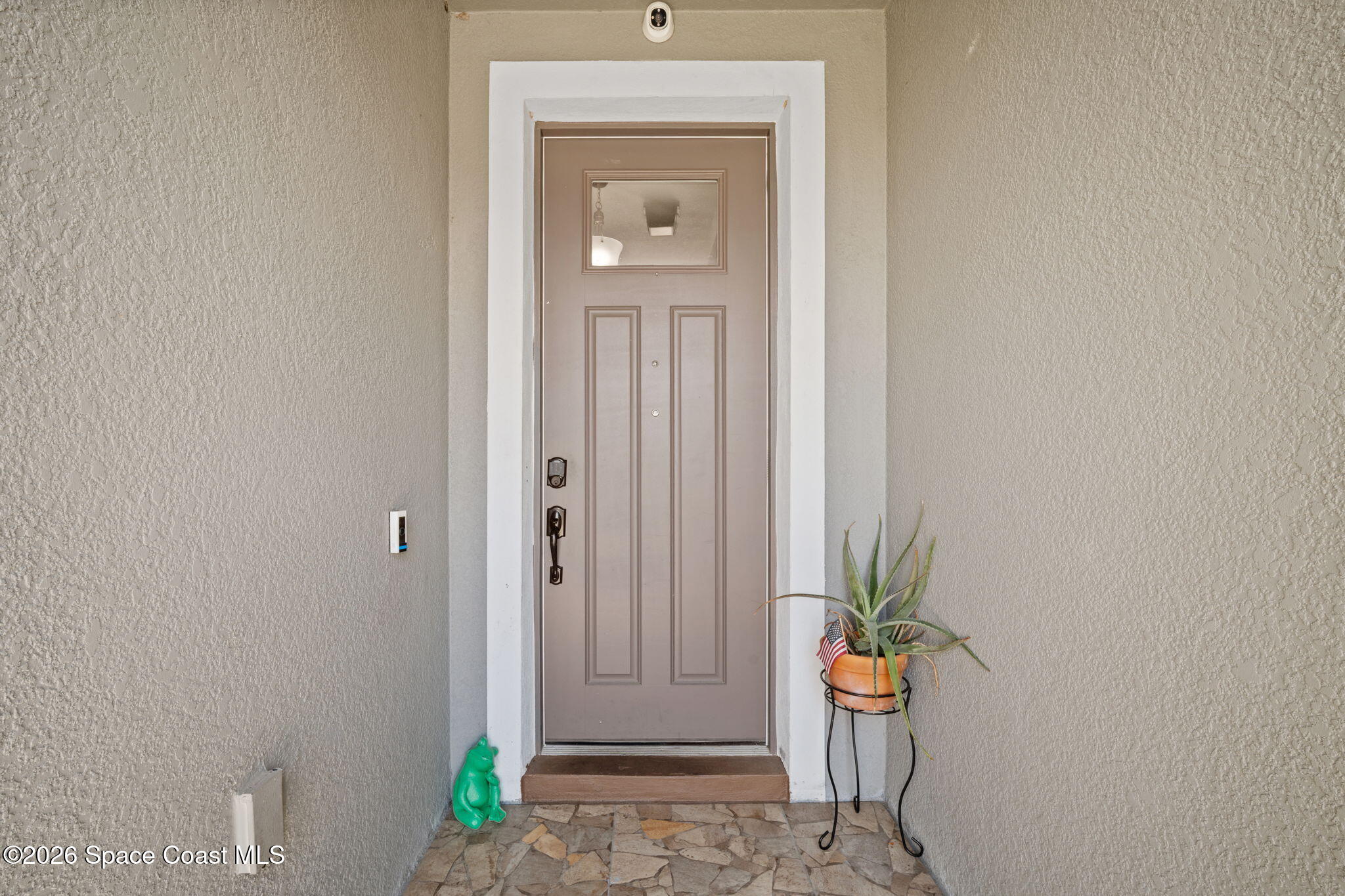 1941 Partin Terrace Road Kissimmee, FL 34744 - Photo 2 of 36 a view of an entryway with wooden floor