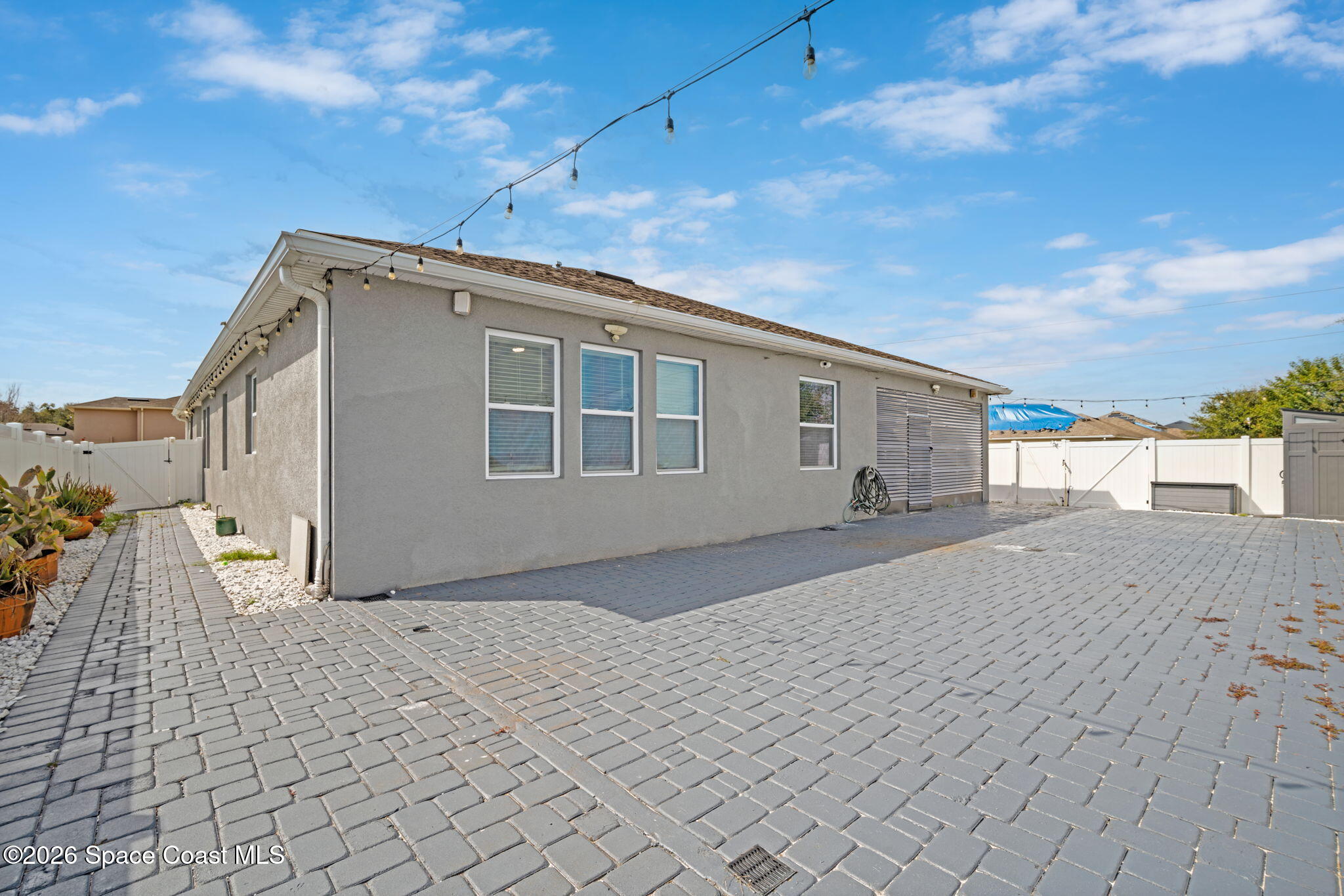 1941 Partin Terrace Road Kissimmee, FL 34744 - Photo 23 of 36 a view of a house with a backyard