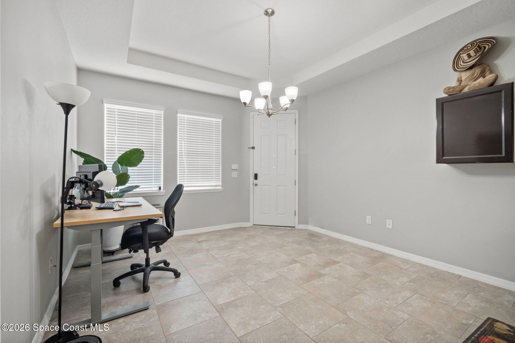 1941 Partin Terrace Road Kissimmee, FL 34744 - Photo 26 of 36 a view of a workspace with furniture and a window