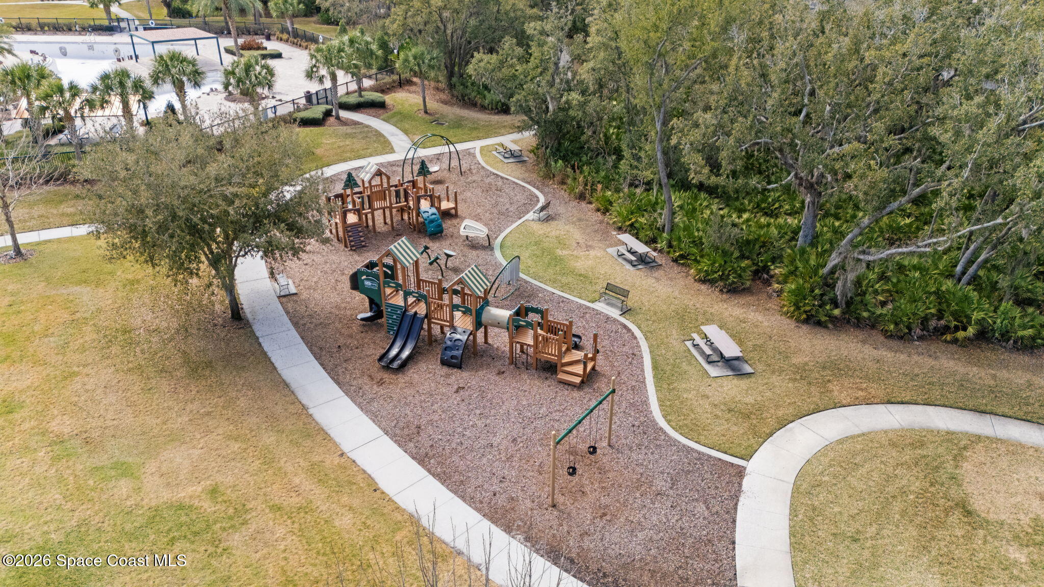 1941 Partin Terrace Road Kissimmee, FL 34744 - Photo 33 of 36 a view of a swimming pool with a yard and seating area