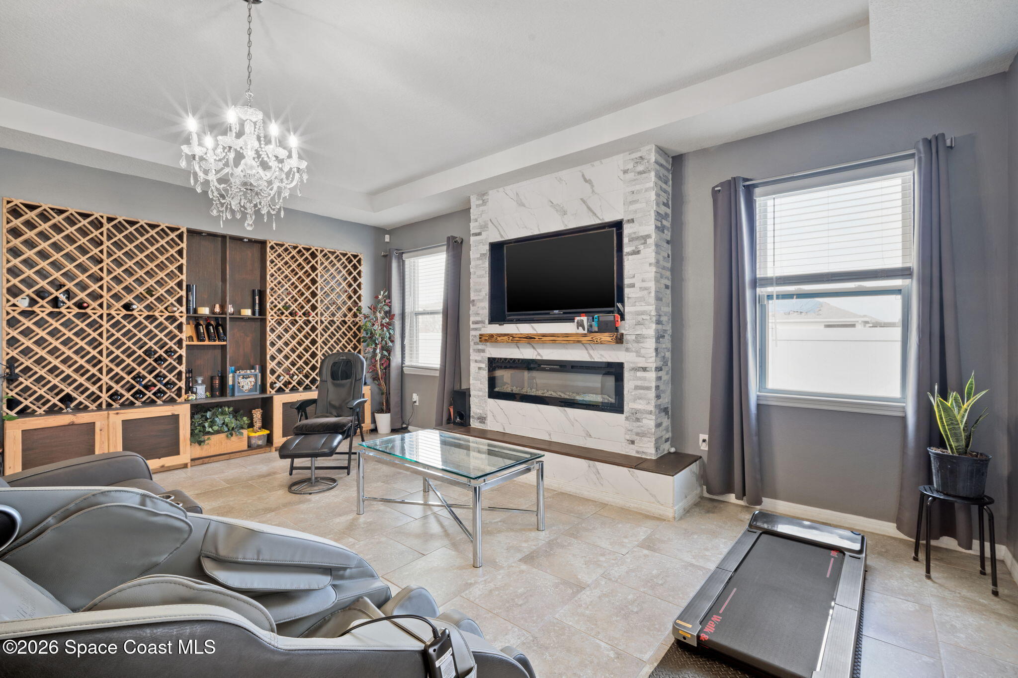 1941 Partin Terrace Road Kissimmee, FL 34744 - Photo 6 of 36 a living room with furniture and a flat screen tv