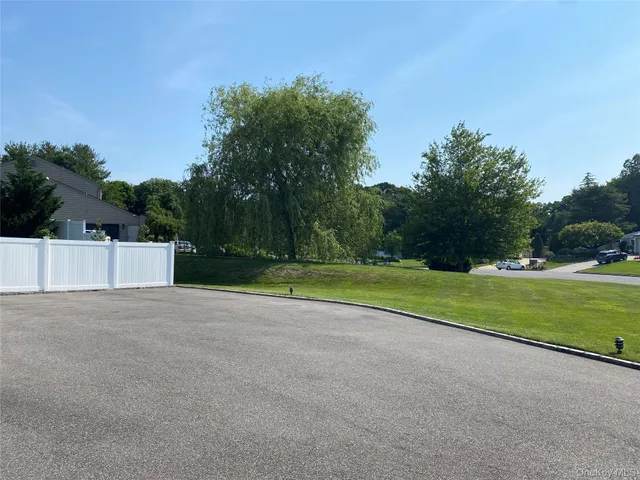 a view of a house with a big yard