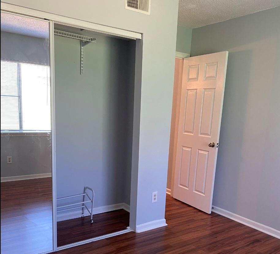 11111 Harrowfield Road Charlotte, NC 28226 - Photo 16 of 26 a view of front door with wooden floor