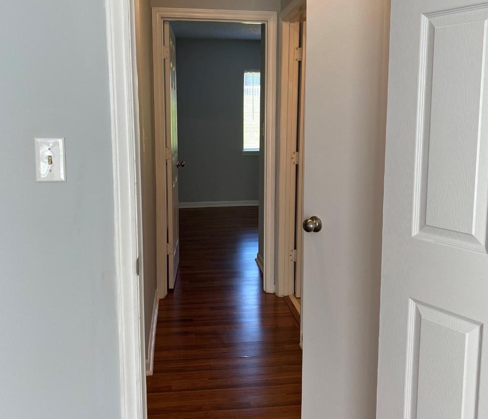 11111 Harrowfield Road Charlotte, NC 28226 - Photo 17 of 26 a view of a hallway with wooden floor