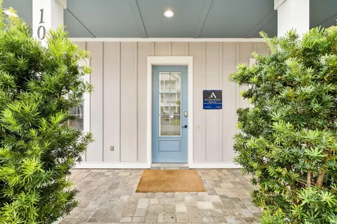 a view of a building with a yard