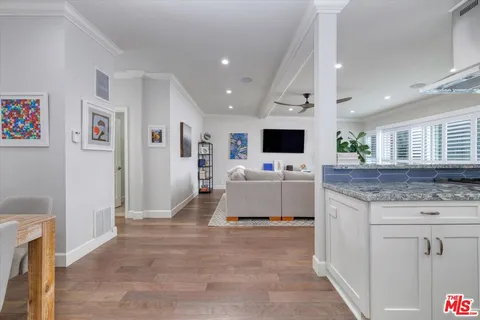 a kitchen with counter top space and appliances