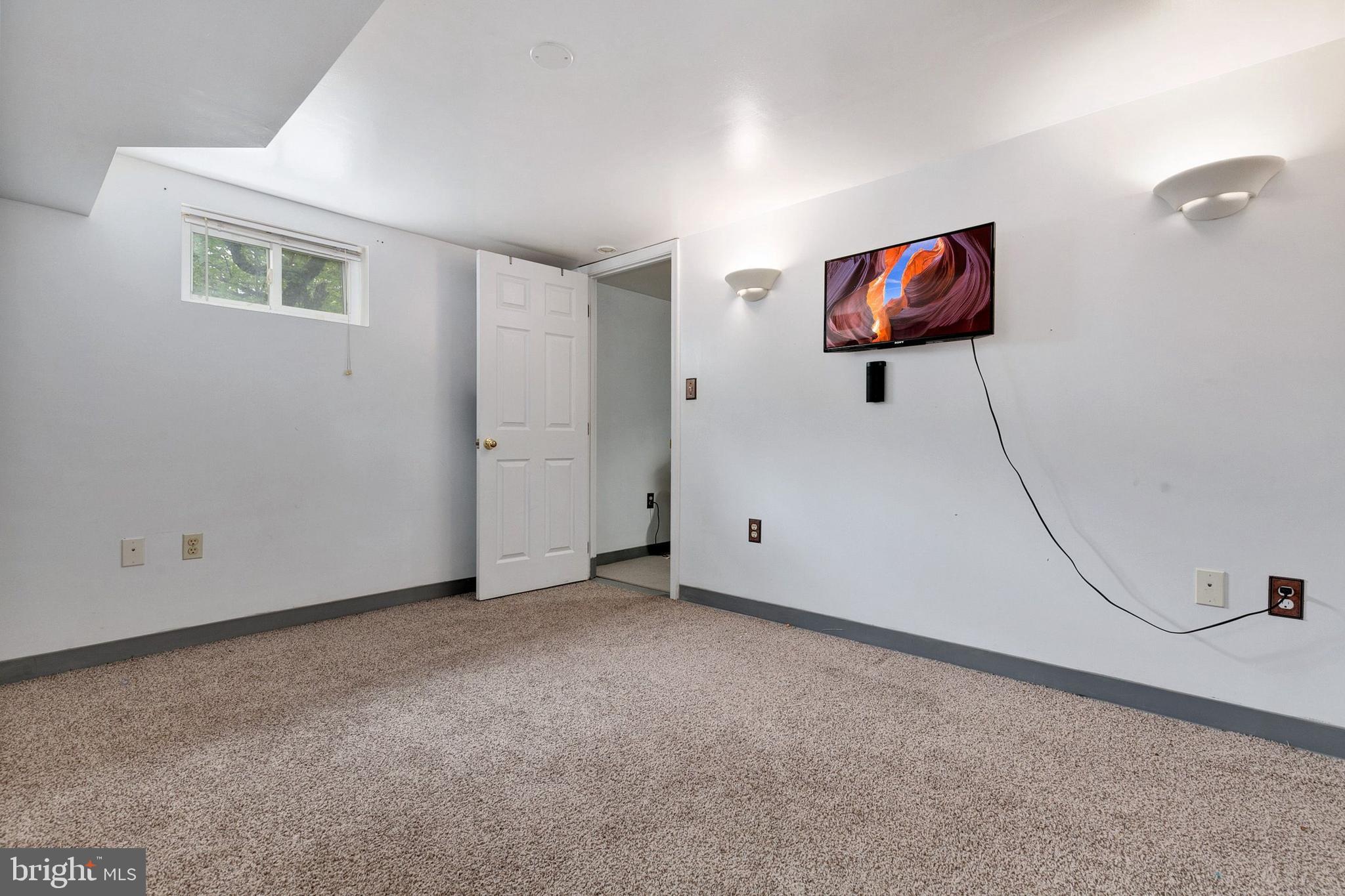 12114 Dalewood Drive Silver Spring, MD 20902 - Photo 17 of 24 a view interior space with window and a ceiling fan