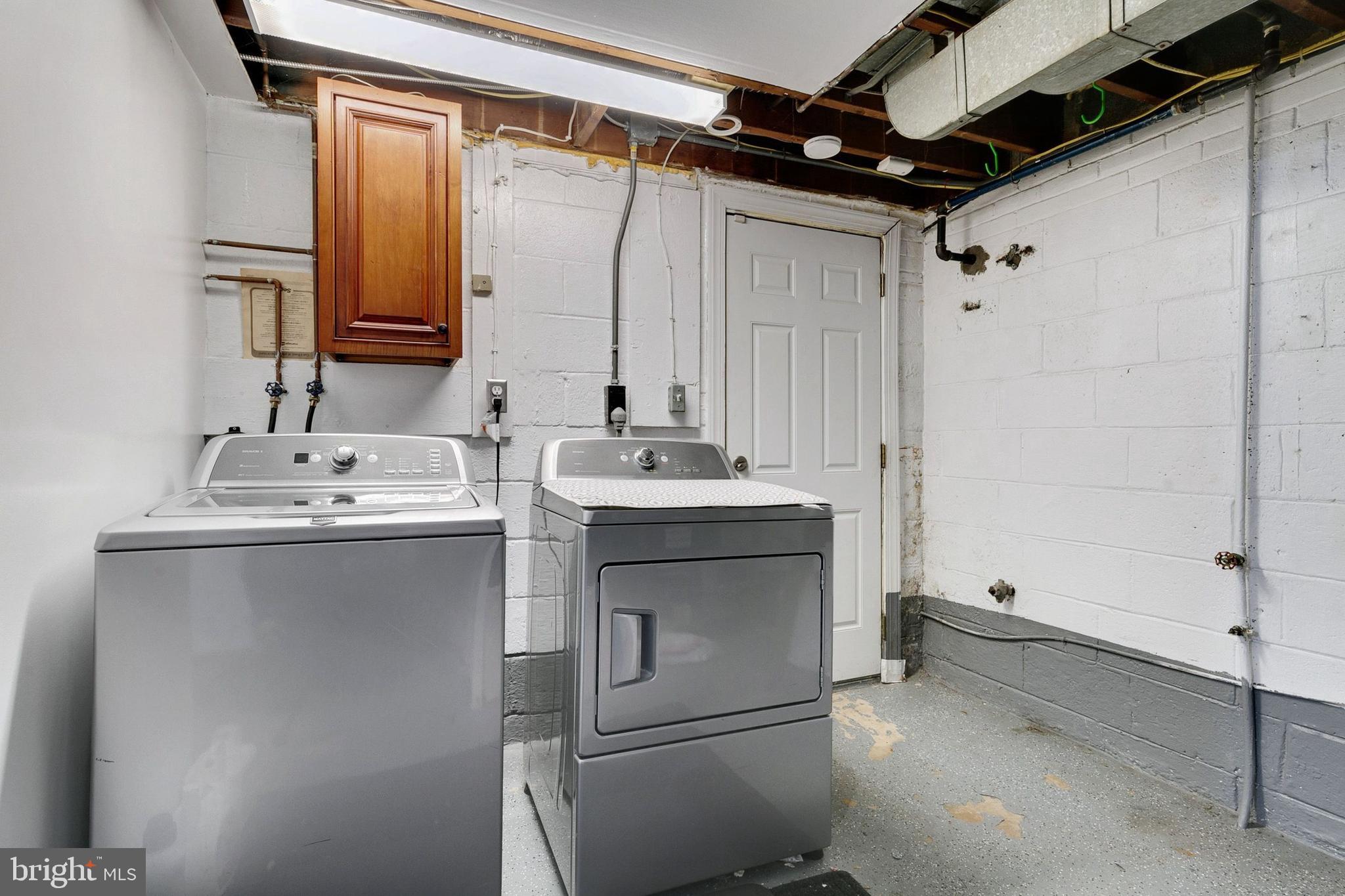 12114 Dalewood Drive Silver Spring, MD 20902 - Photo 20 of 24 a bathroom with a sink toilet and shower