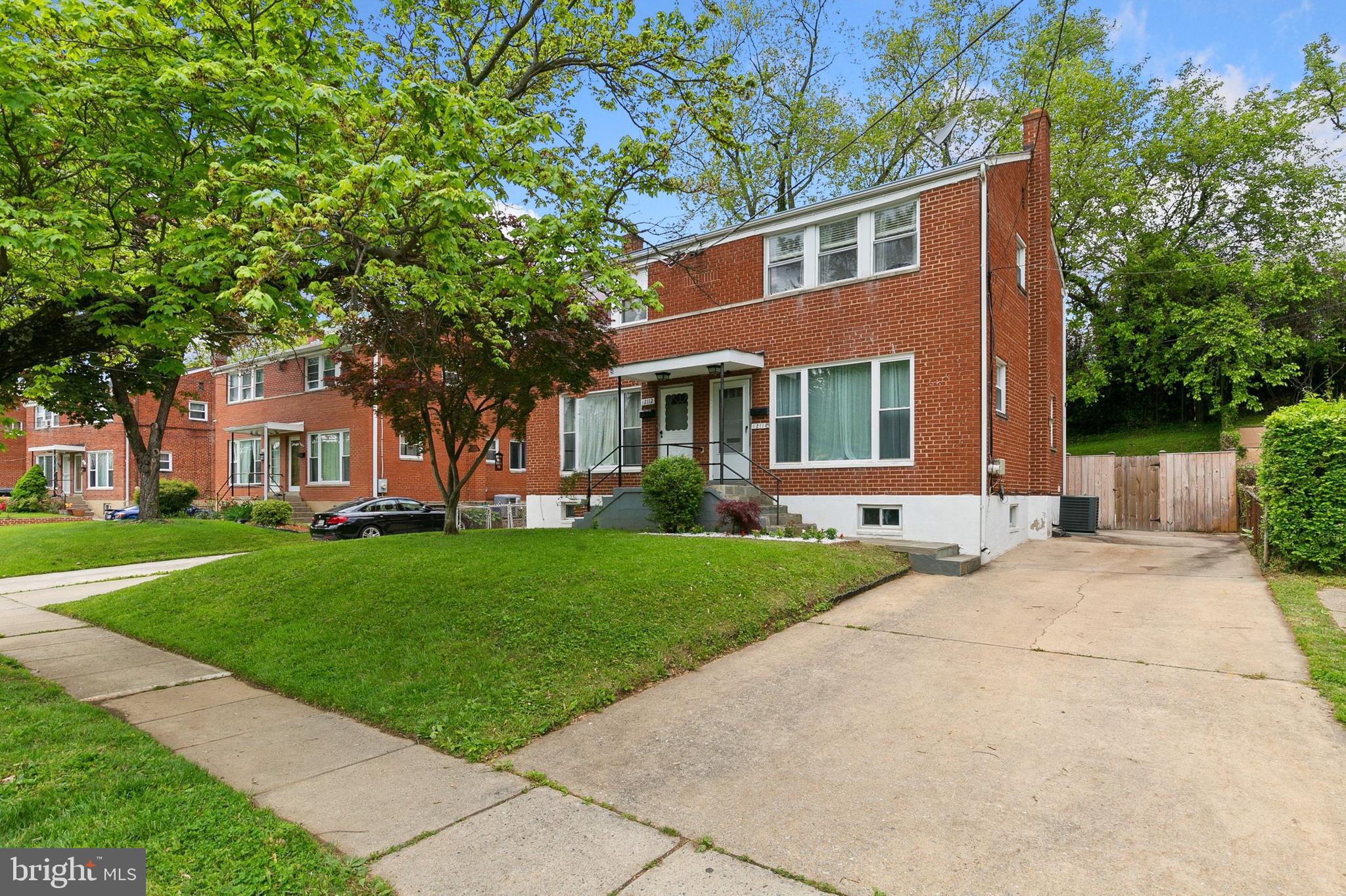 12114 Dalewood Drive Silver Spring, MD 20902 - Photo 3 of 24 a front view of a house with a garden