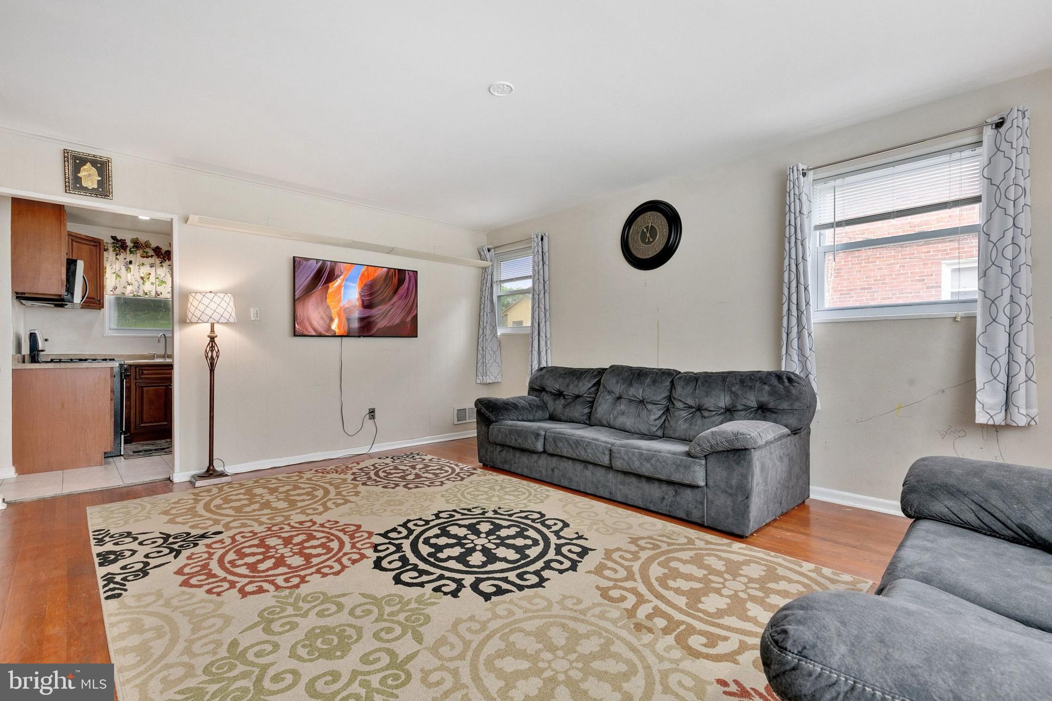 12114 Dalewood Drive Silver Spring, MD 20902 - Photo 6 of 24 a living room with furniture and a window