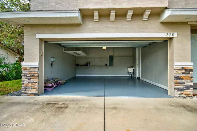 a view of a house with a garage