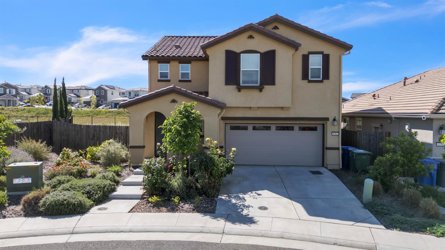 4562 Butterfly Ridge Drive Folsom, CA 95630 - Photo 1 of 44 a front view of a house with a yard