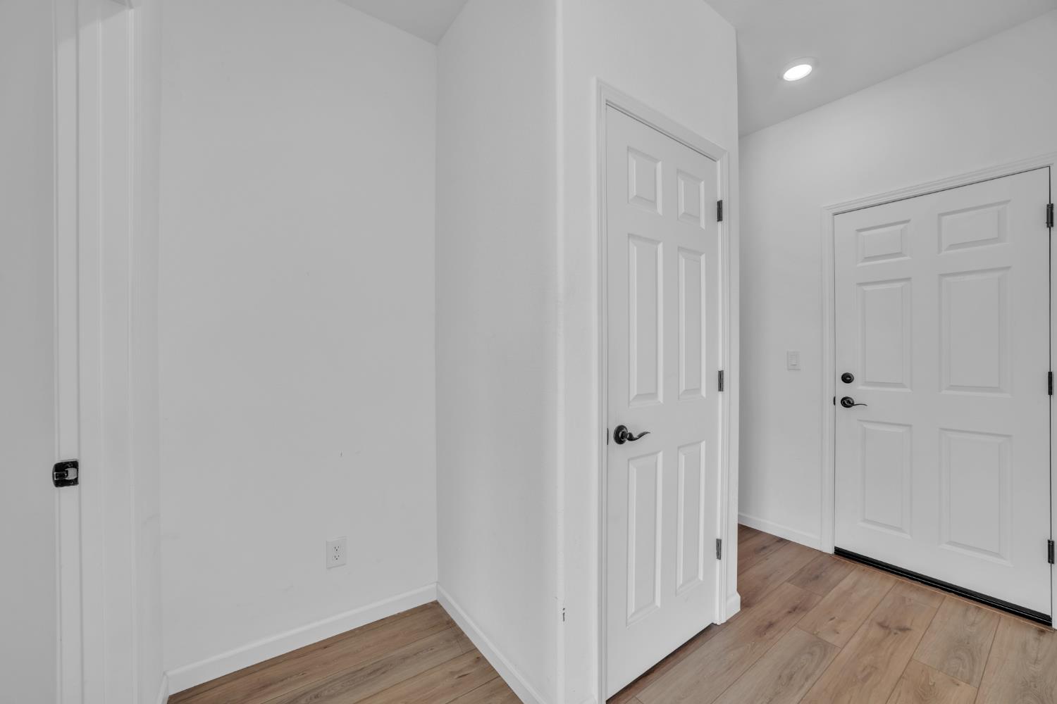 4562 Butterfly Ridge Drive Folsom, CA 95630 - Photo 14 of 44 a view of a hallway with wooden floor