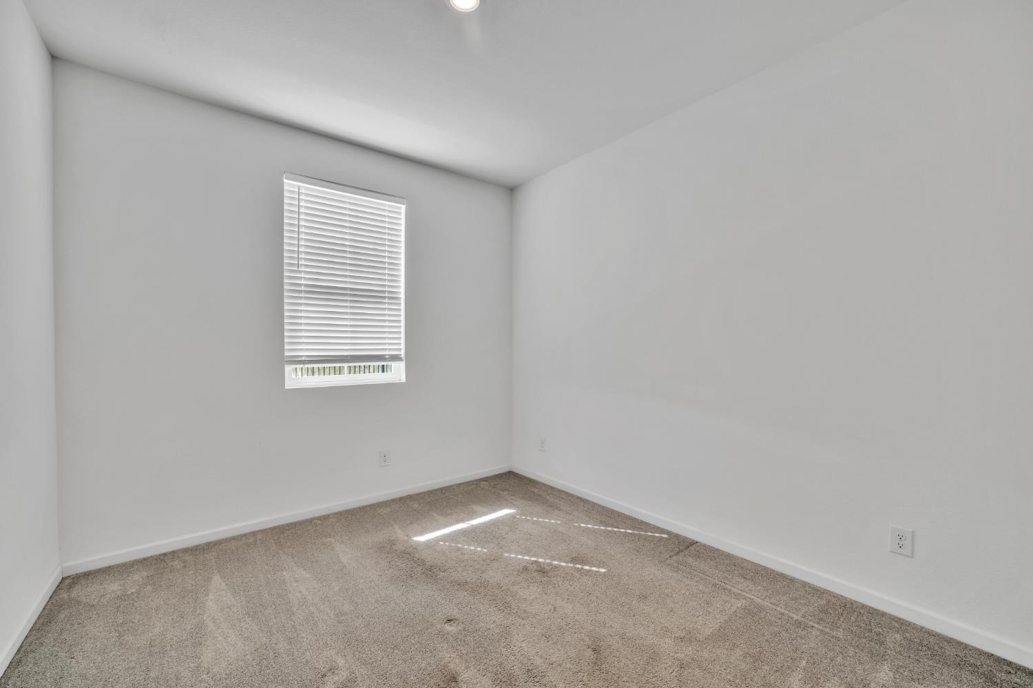4562 Butterfly Ridge Drive Folsom, CA 95630 - Photo 15 of 44 an empty room with a window