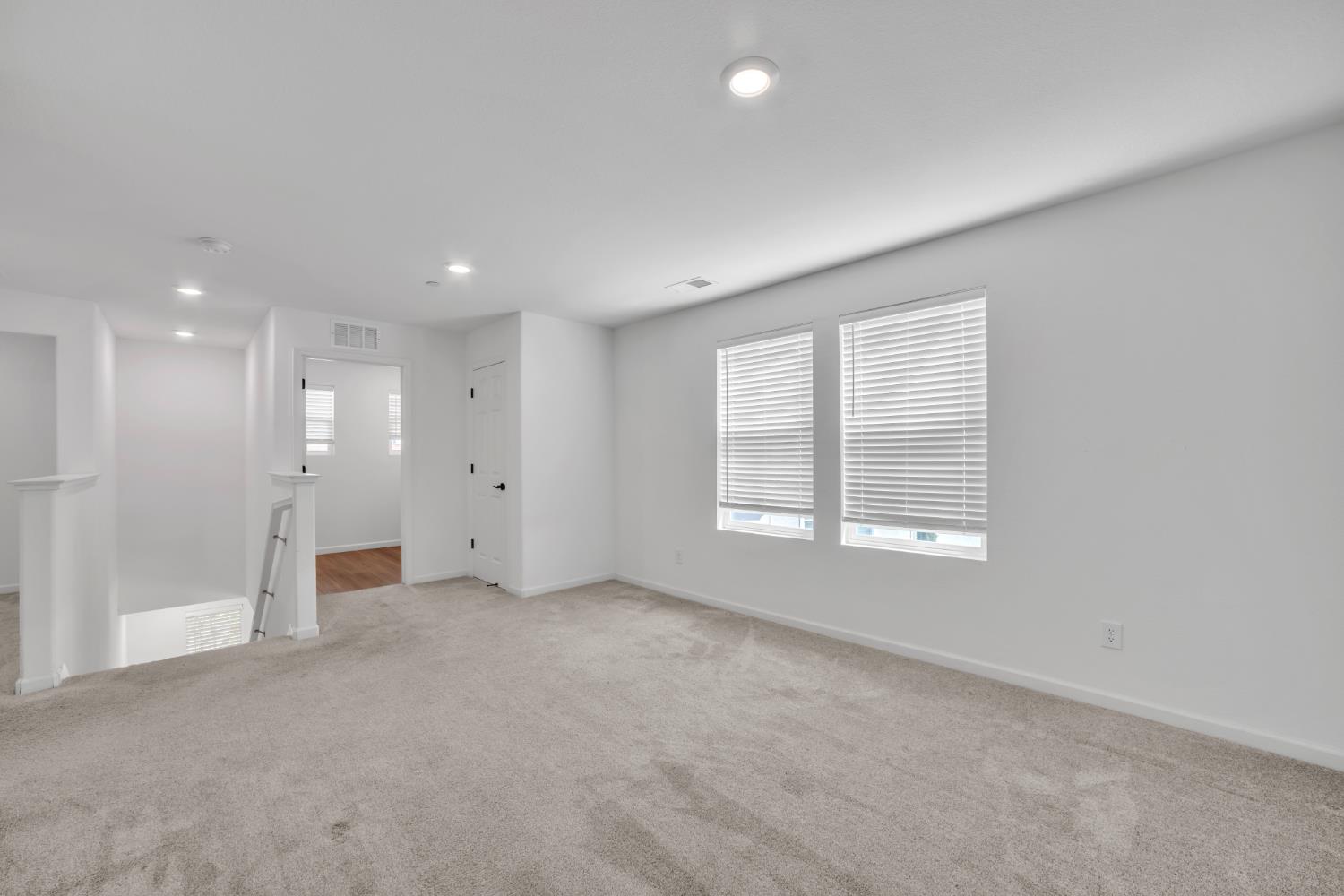 4562 Butterfly Ridge Drive Folsom, CA 95630 - Photo 20 of 44 an empty room with windows