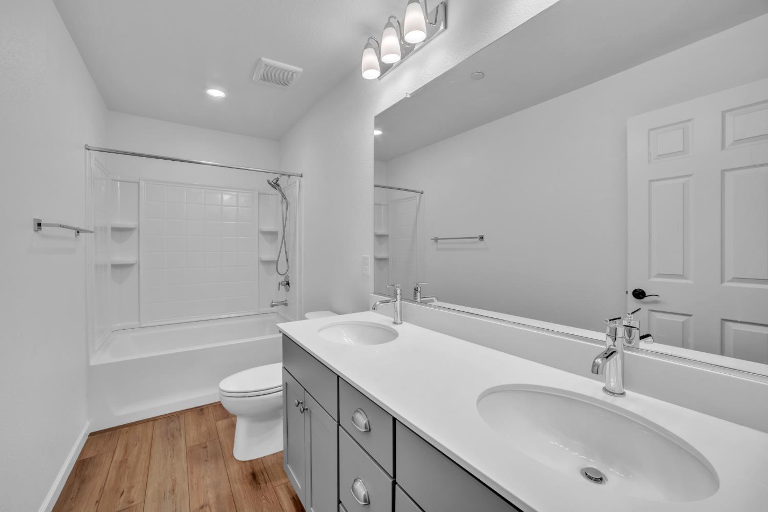 4562 Butterfly Ridge Drive Folsom, CA 95630 - Photo 30 of 44 a bathroom with a sink a toilet a tub and shower