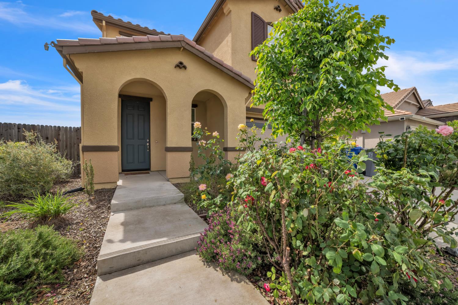 4562 Butterfly Ridge Drive Folsom, CA 95630 - Photo 3 of 44 a front view of a house with a yard