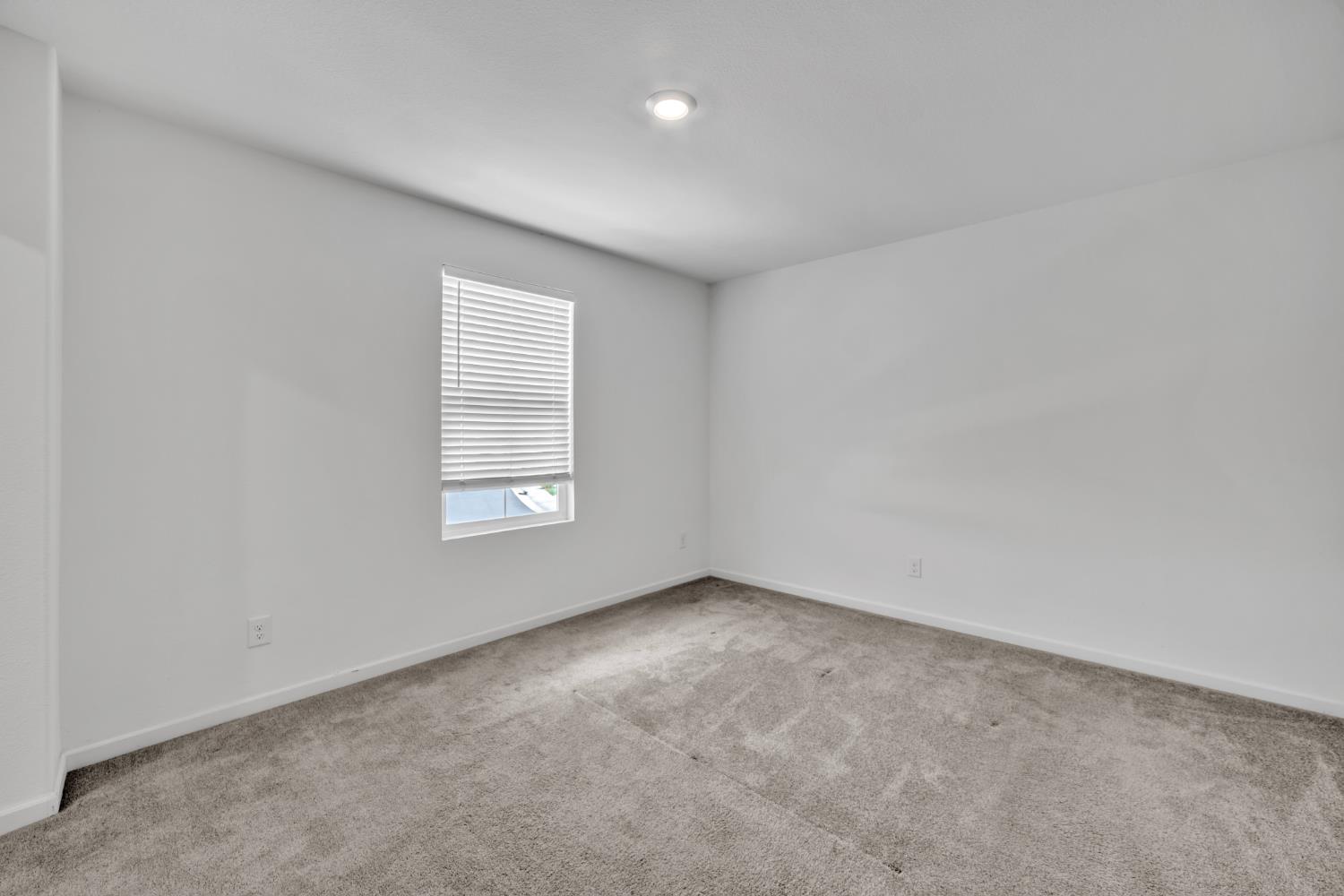 4562 Butterfly Ridge Drive Folsom, CA 95630 - Photo 31 of 44 an empty room with a window