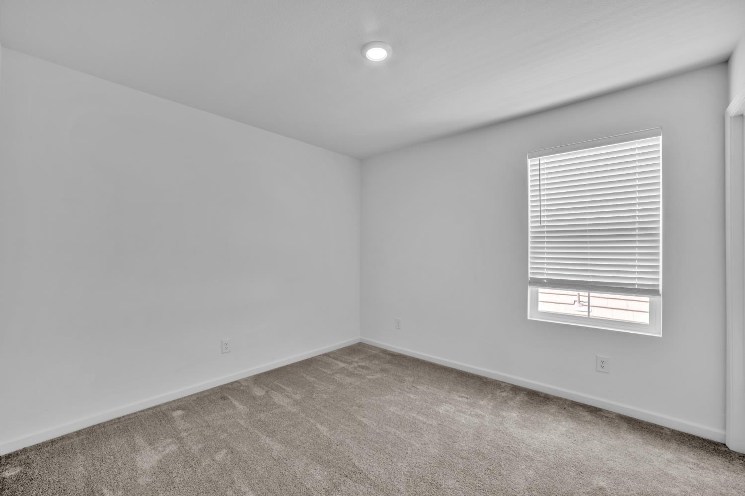 4562 Butterfly Ridge Drive Folsom, CA 95630 - Photo 33 of 44 an empty room with a window