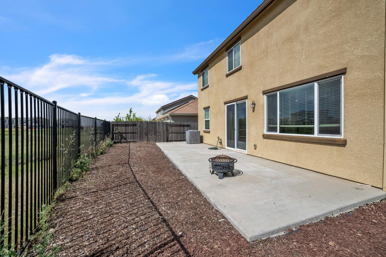 4562 Butterfly Ridge Drive Folsom, CA 95630 - Photo 37 of 44 a view of a house with a backyard