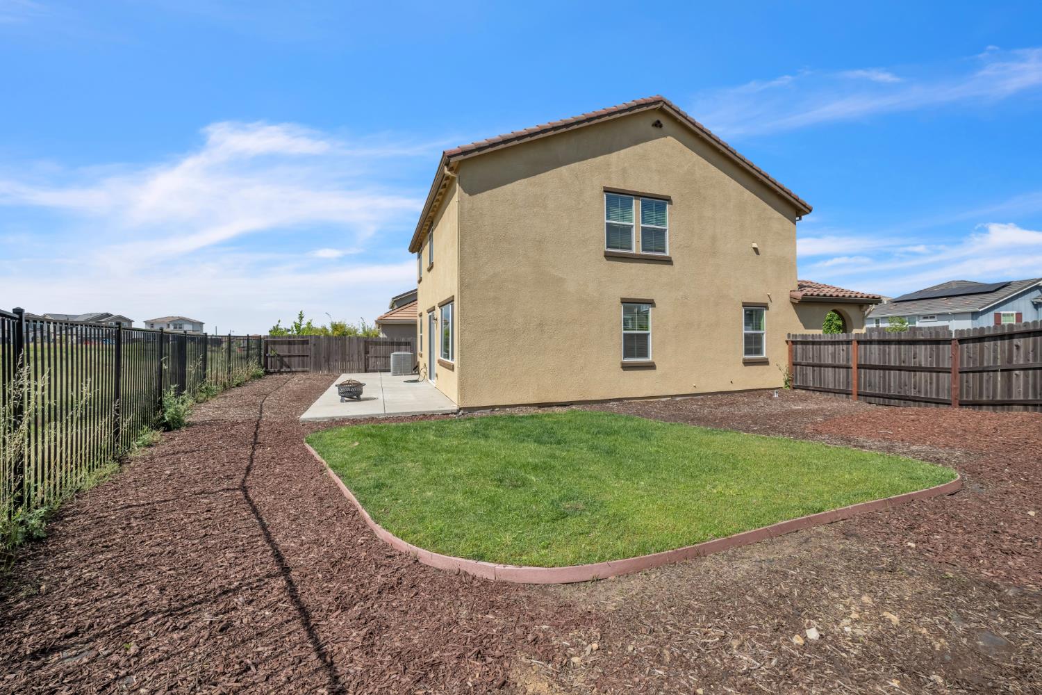 4562 Butterfly Ridge Drive Folsom, CA 95630 - Photo 38 of 44 a view of a house with a backyard