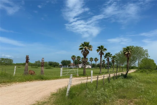 a view of a lake with a big yard